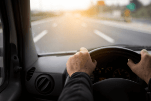 What Is the Leading Cause of Vehicle Accidents. Person driving down the road