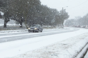 Whats the Leading Cause of Vehicle Accidents Car Driving Down Icy Road Image